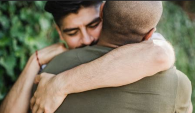 People embracing, showing community support